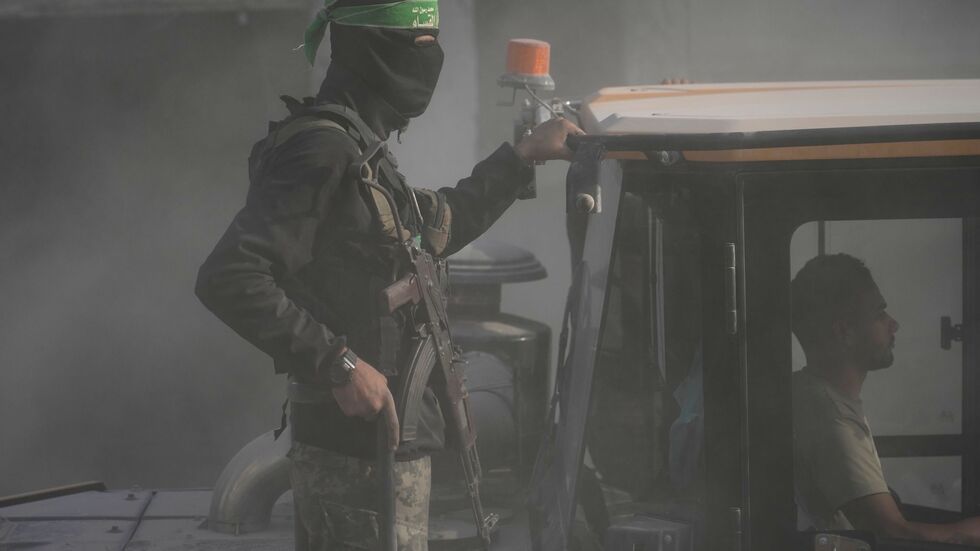 Bewaffnetes Mitglied der islamistischen Terrororganisation Hamas im Gazastreifen. Bewaffnetes Mitglied der islamistischen Terrororganisation Hamas im Gazastreifen.